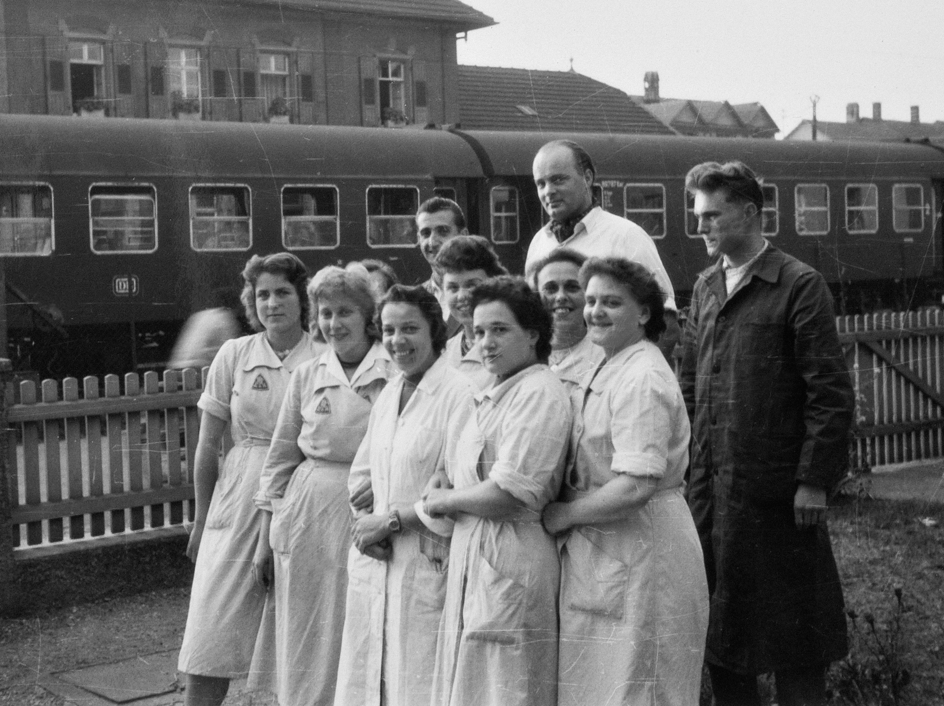 Georg H Endress in the 1950s with employees from production in Lörrach, Germany.